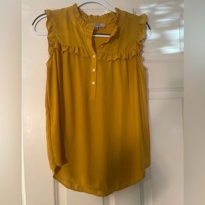 Yellow blouse with frills